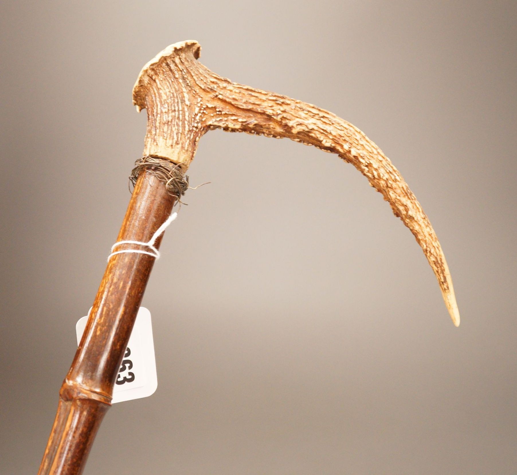 An antler handled walking stick, 90cm total
